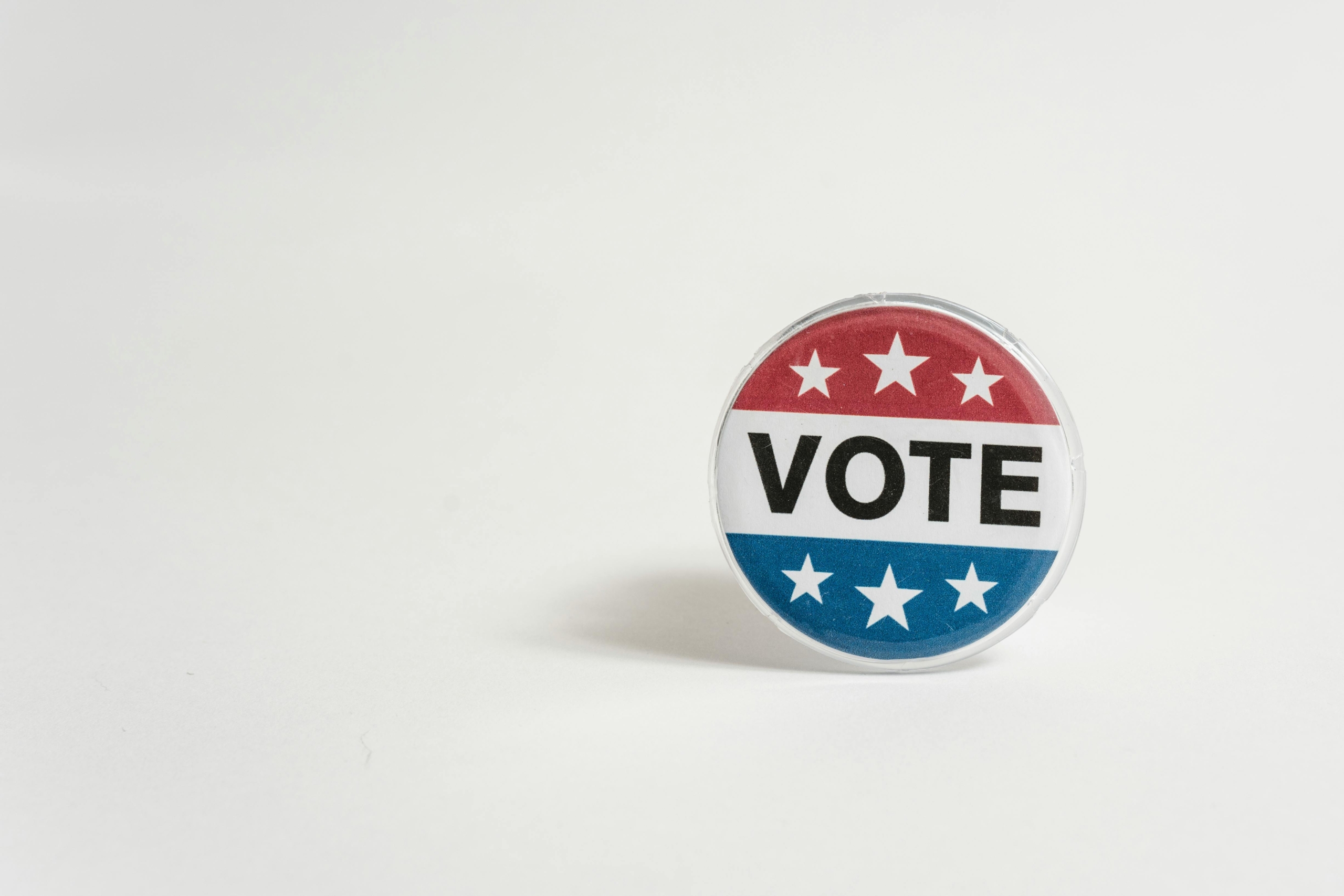 https://www.pexels.com/photo/us-vote-badge-5926403/