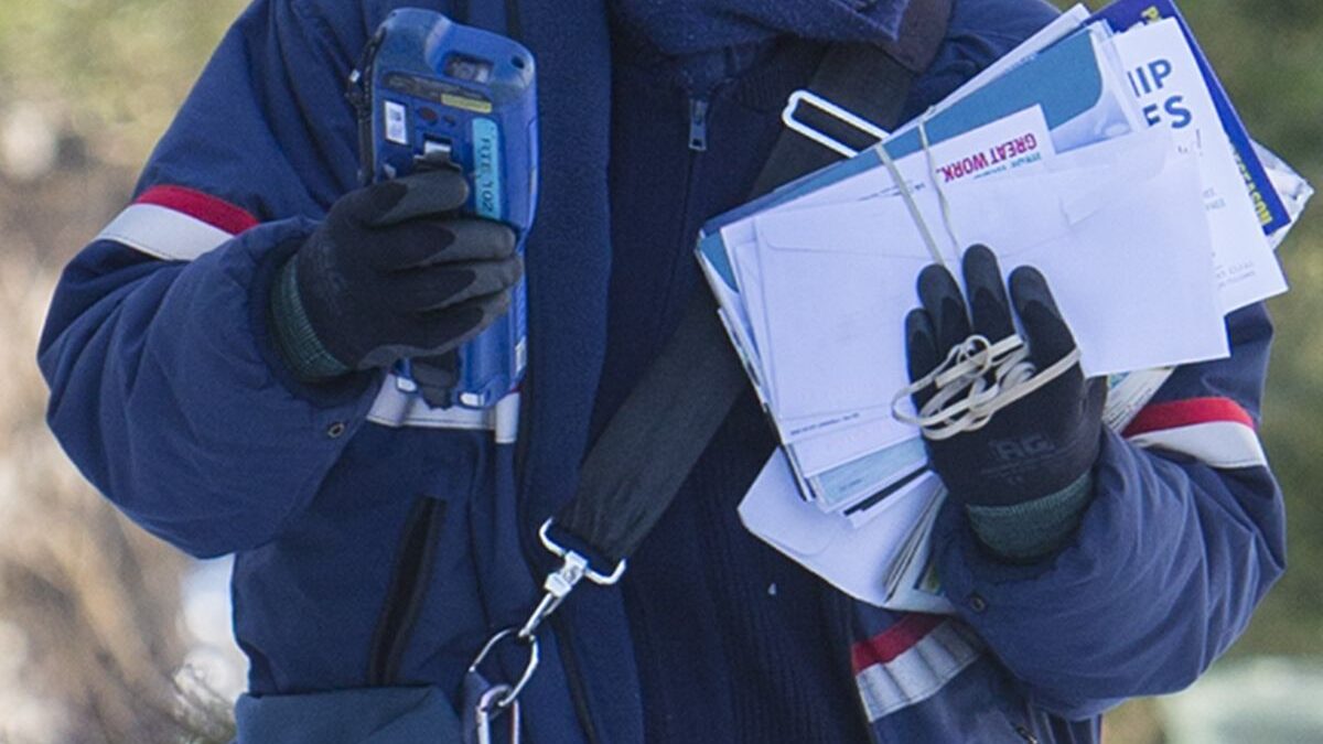 https://media.usps.com/photos/letter-carrier-in-cold-weather/