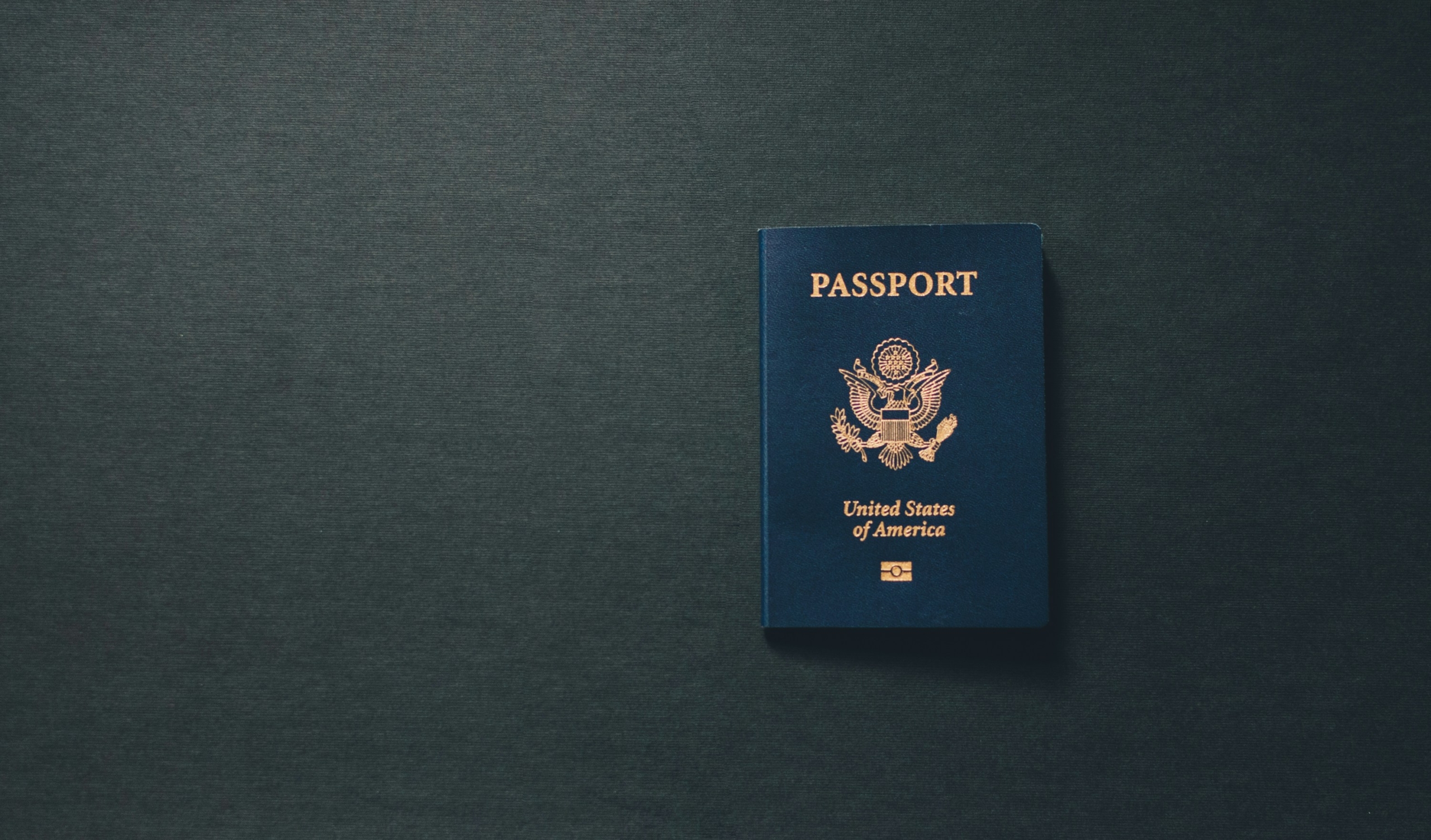 https://unsplash.com/photos/passport-book-RiUZQOfQ8XE